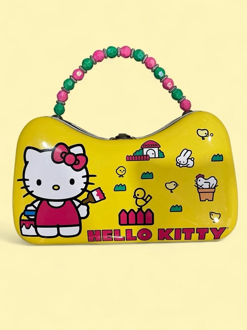 BRAND NEW Hello Kitty Sanrio yellow tin purse with beaded handle